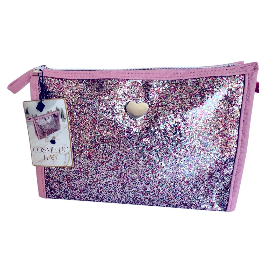 Pink Glitter Cosmetic Bag with a Silver Heart on Clear Vinyl & a Silver Zipper.